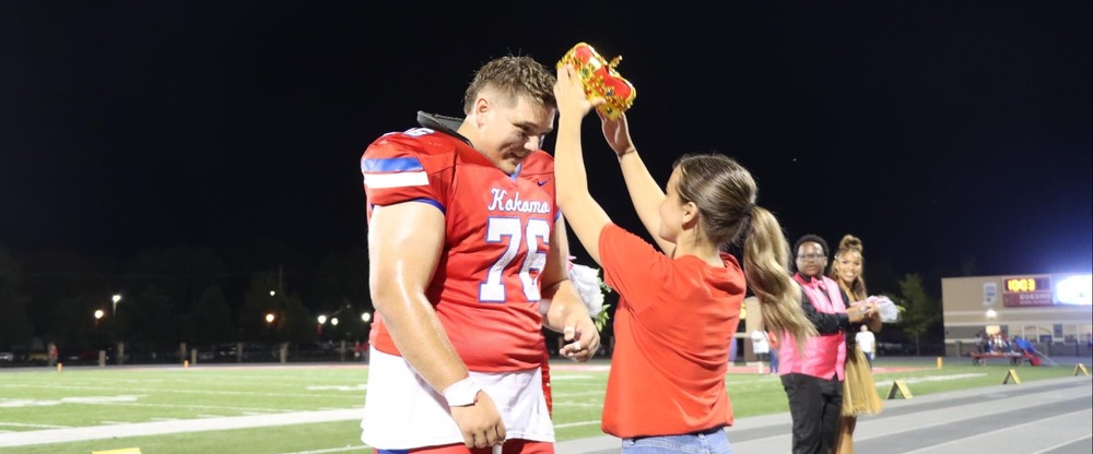 football player crowned homecoming king