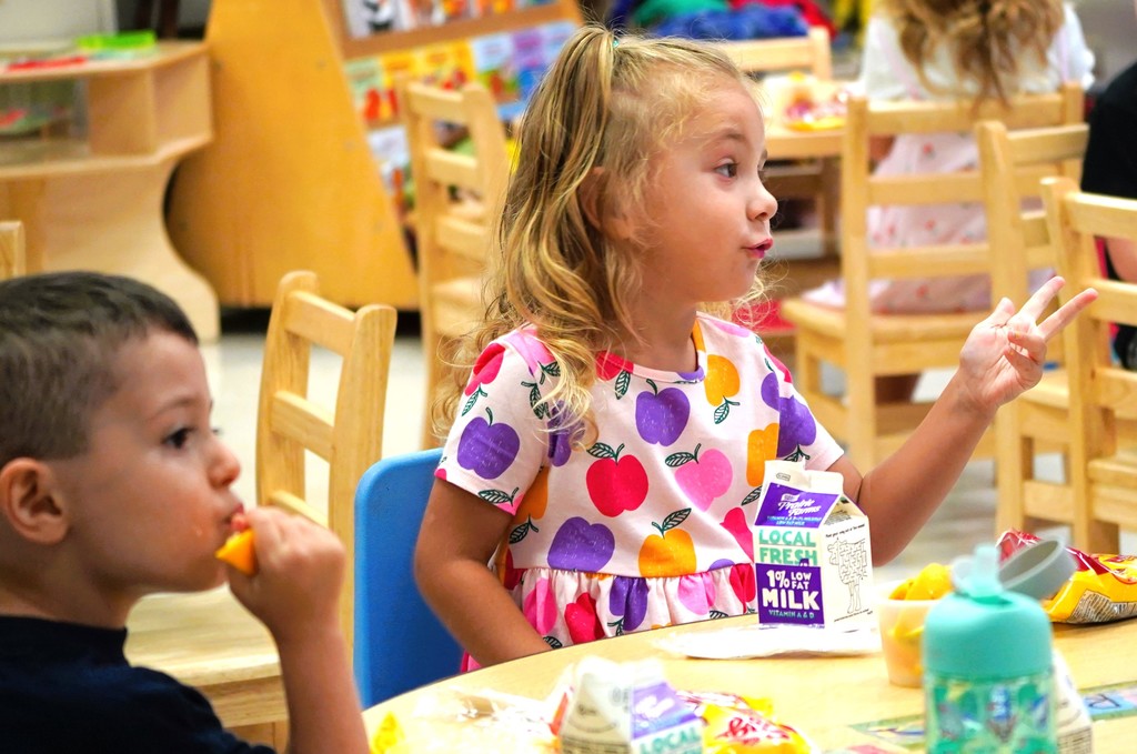 boy and girl eating healthy school breakfast