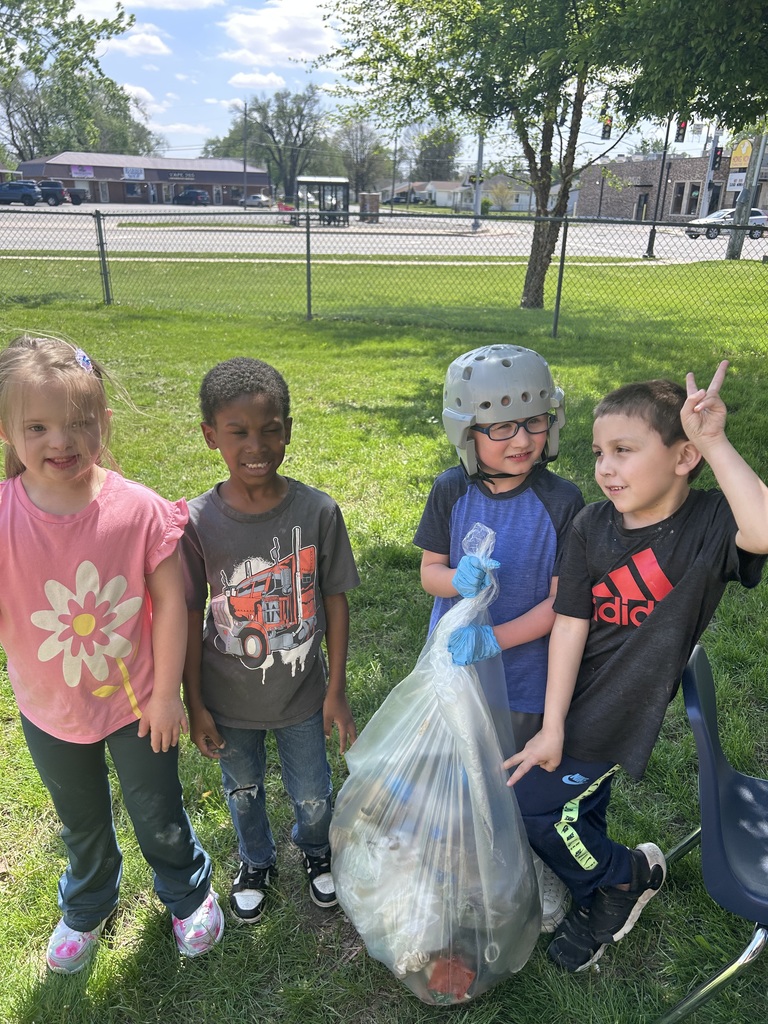 Students worked together to pick up trash around the school grounds in honor of Earth Day.