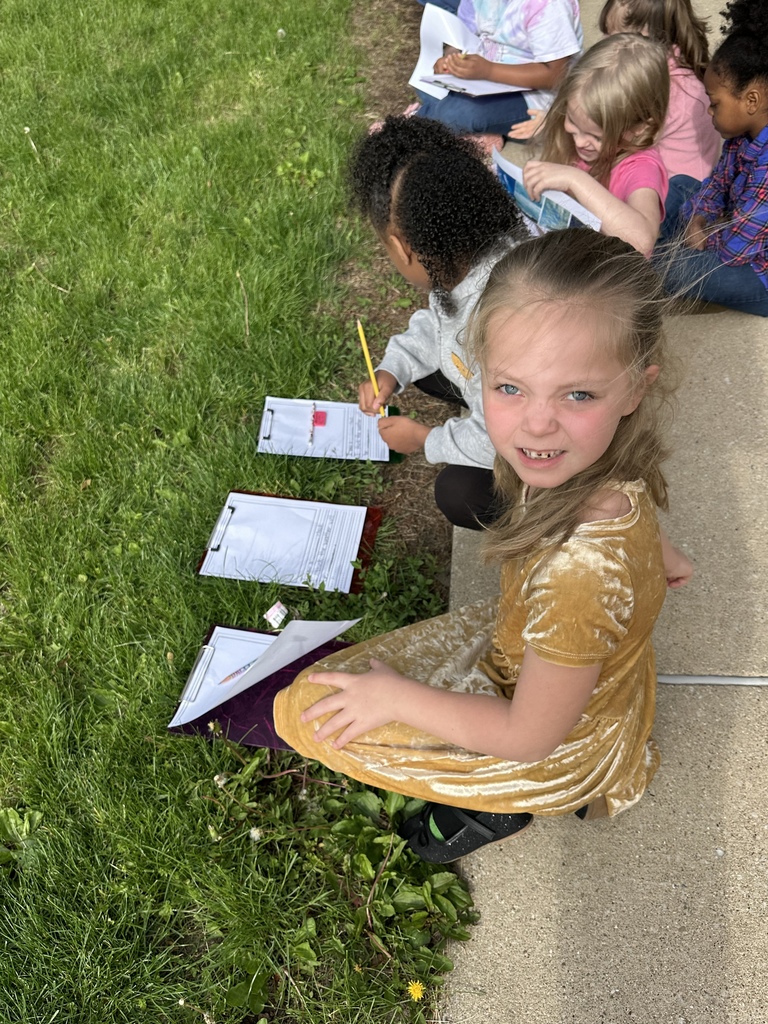 Students work together to learn about cloud formations.