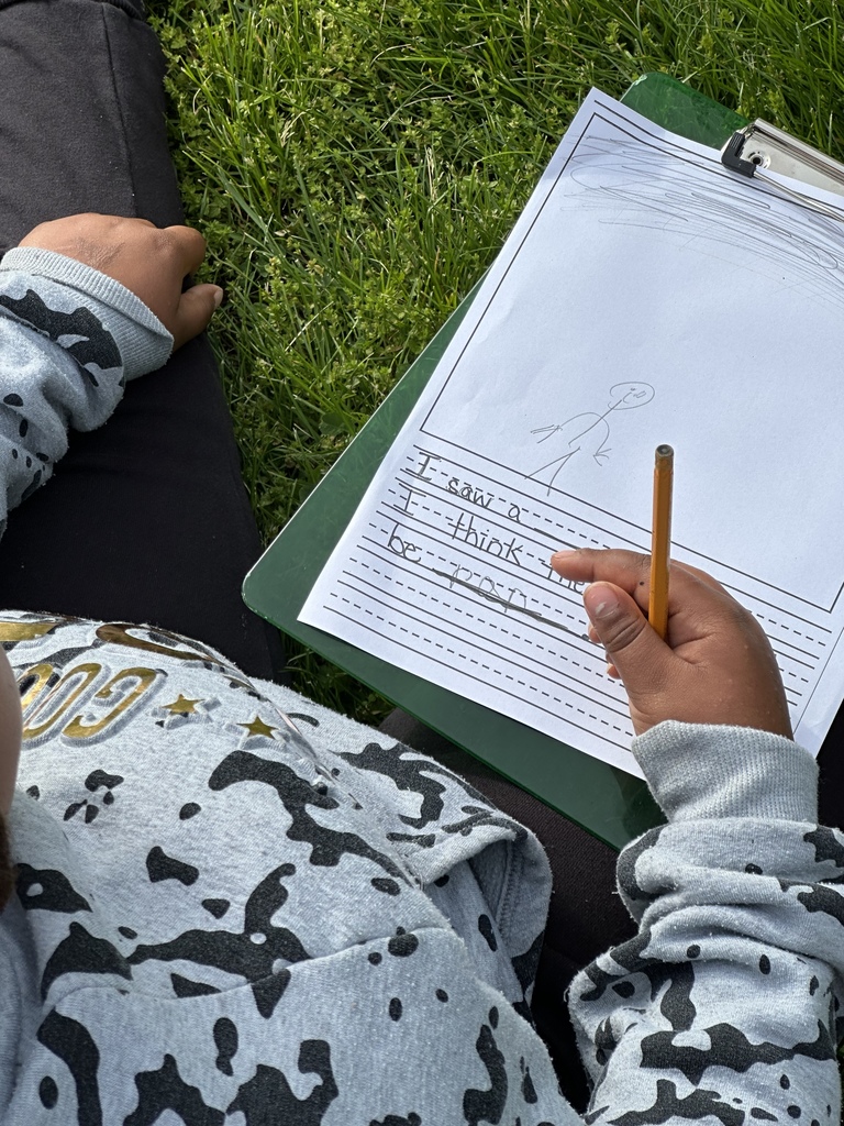 A student writes about the clouds in a sentence.