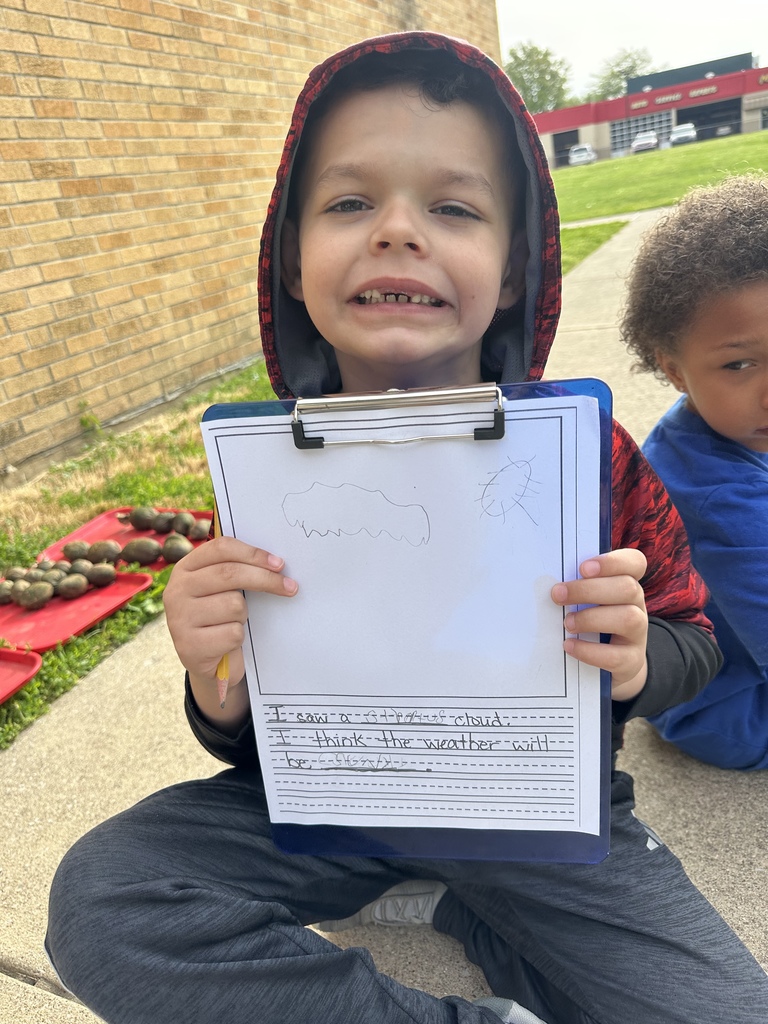 A proud meteorologist shows off their work! 