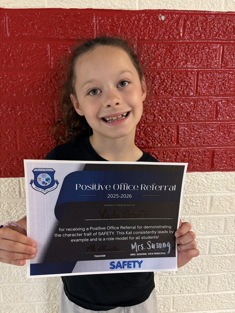 Students hold their positive office referral for May 2026.