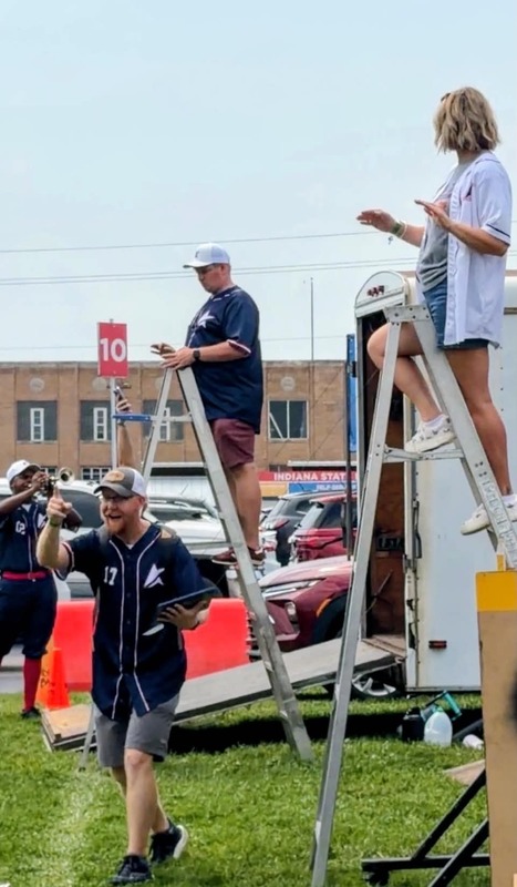 band directors on ladders