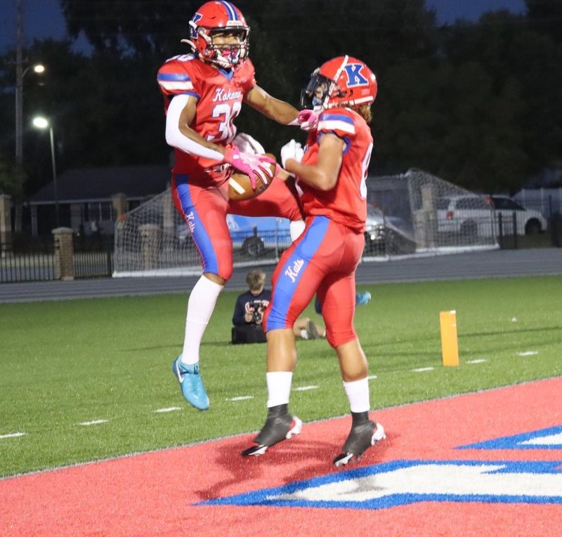 football players celebrating touch down