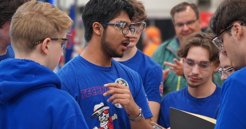 students talking about robotics