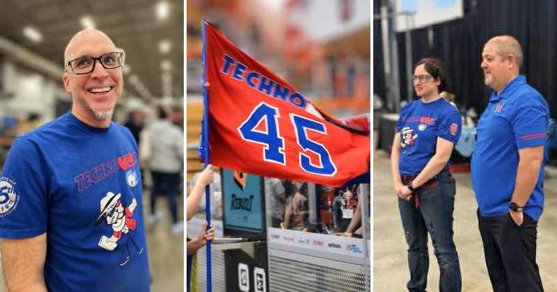 man and woman standing smiling wearing safety goggles and technokats flag waving