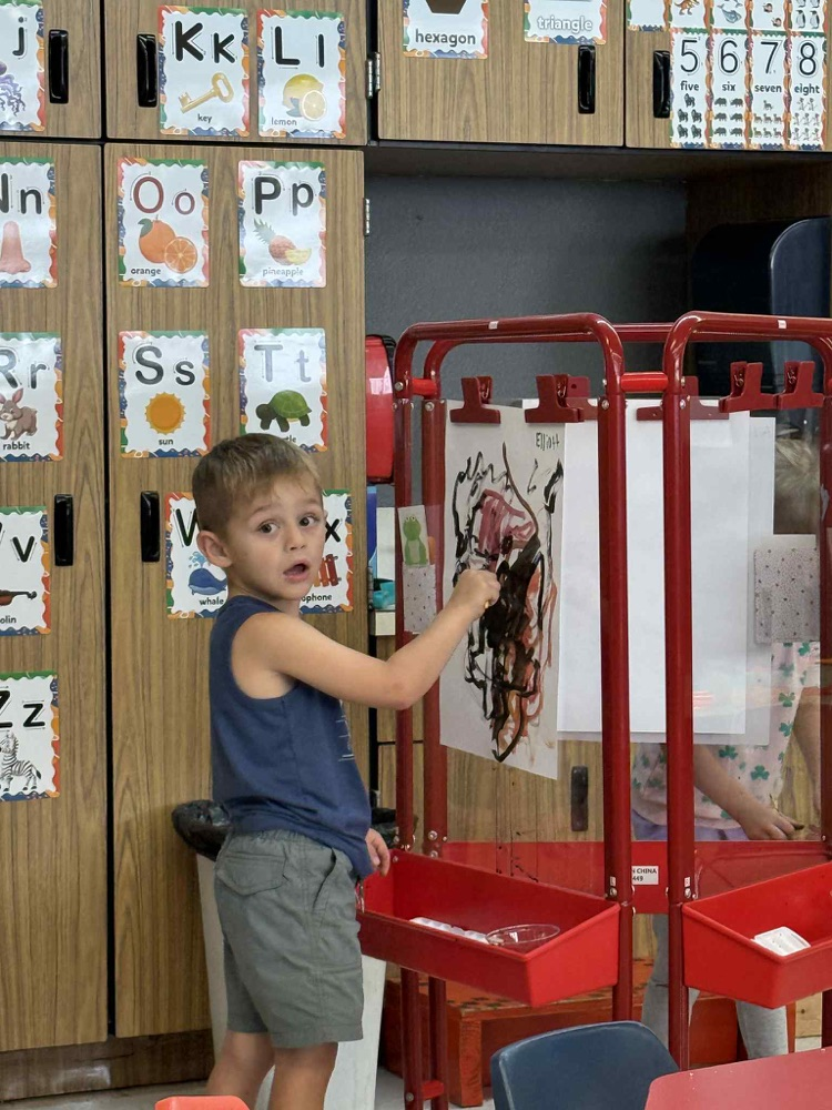 painting at the easel