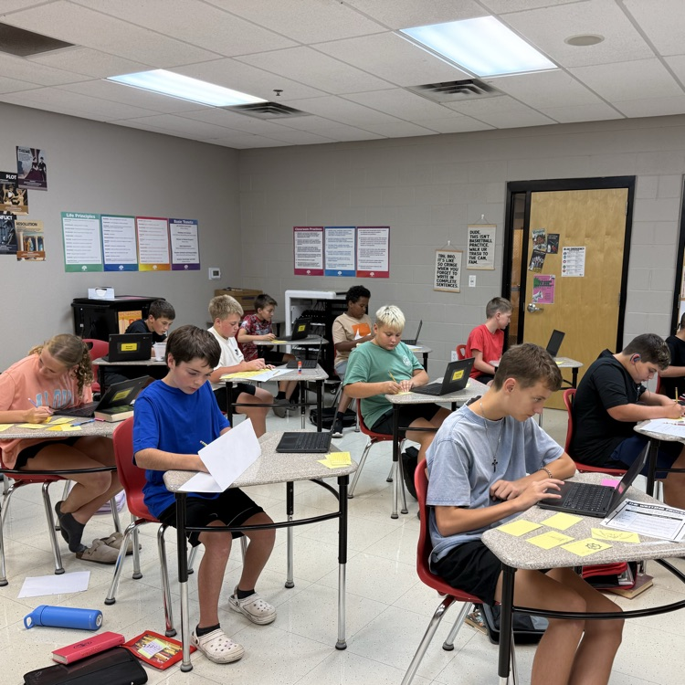 students doing timeline research using computers