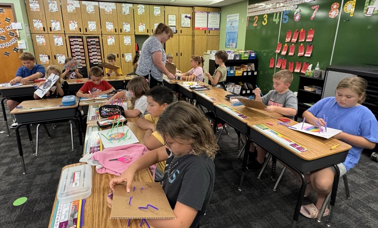 Students working on crafts.