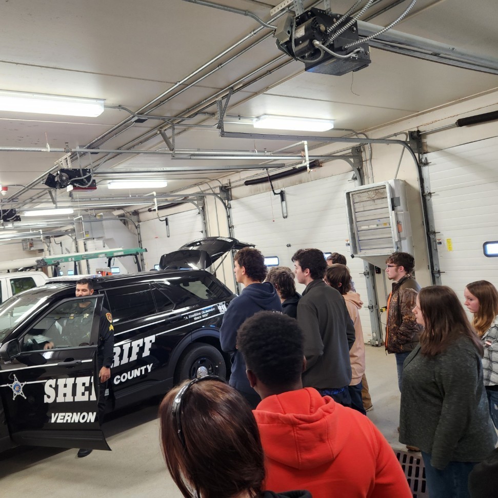 Kids with Sheriff Vehicle