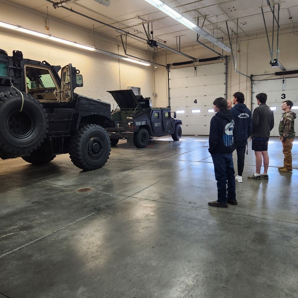 Kids with the Tactical Vehicles