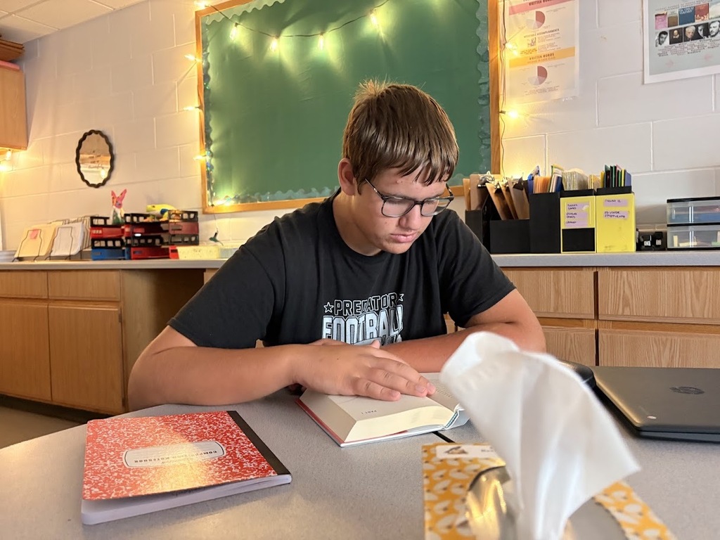 student reading novel
