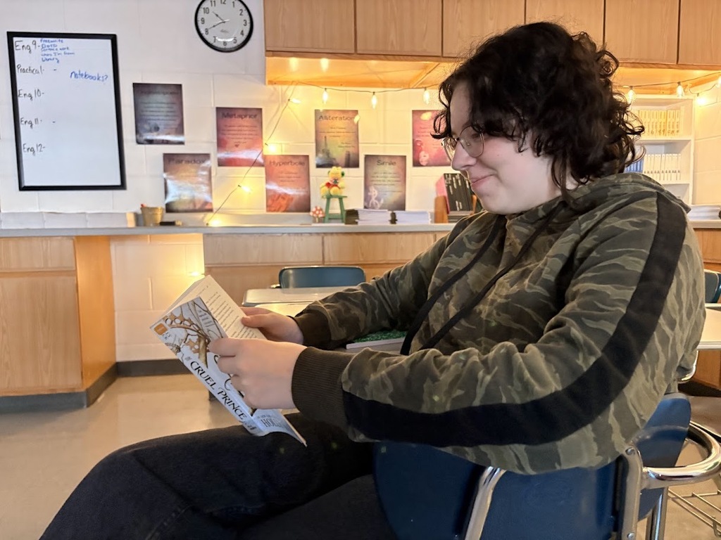 student reading novel