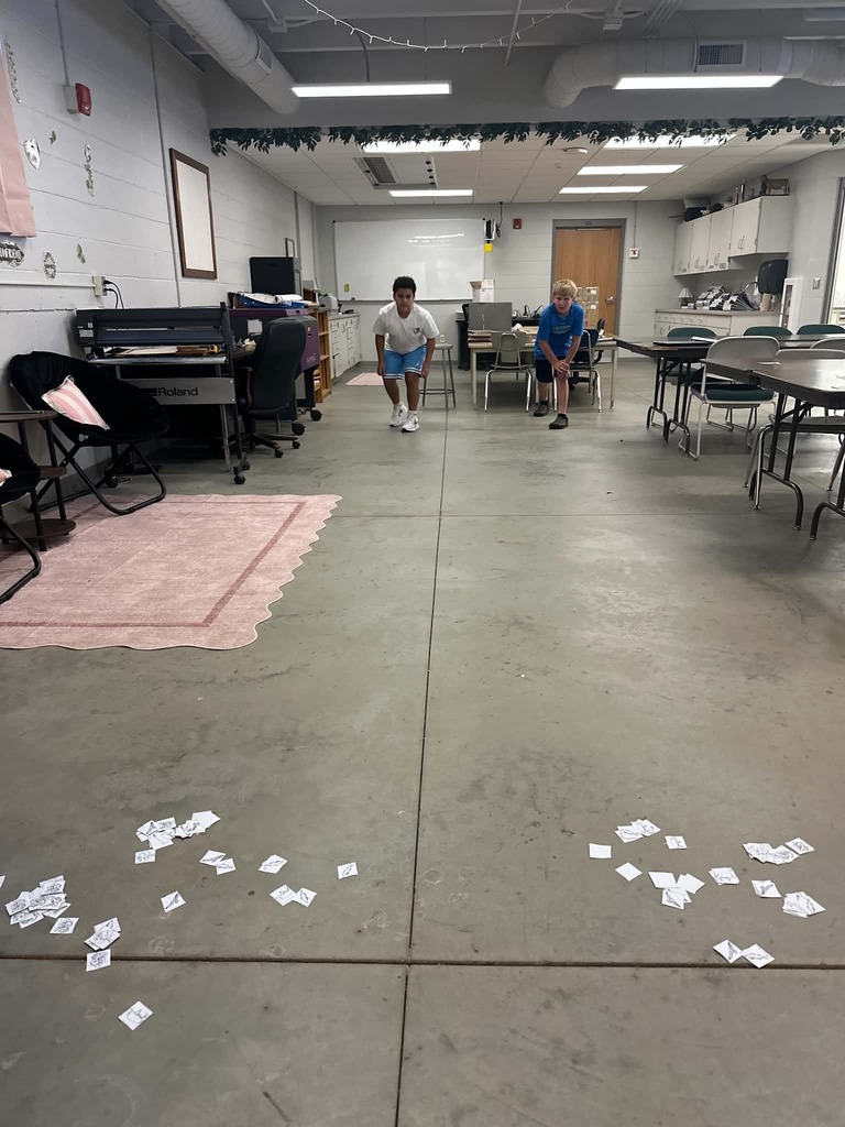 students race to gather cards