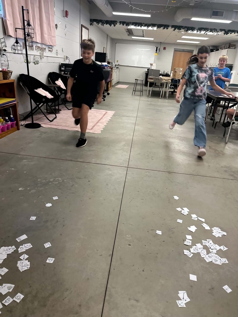 students race to gather cards