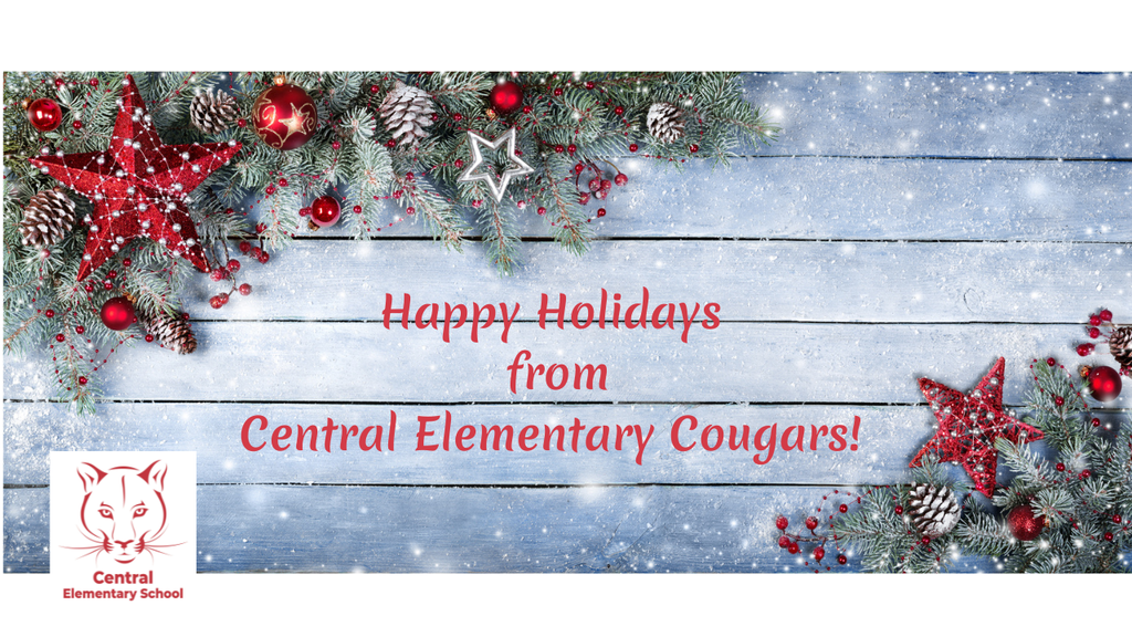 happy holidays red letters on wooden sign with greenery and red stars