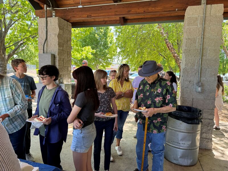 students and pen pals getting their lunches