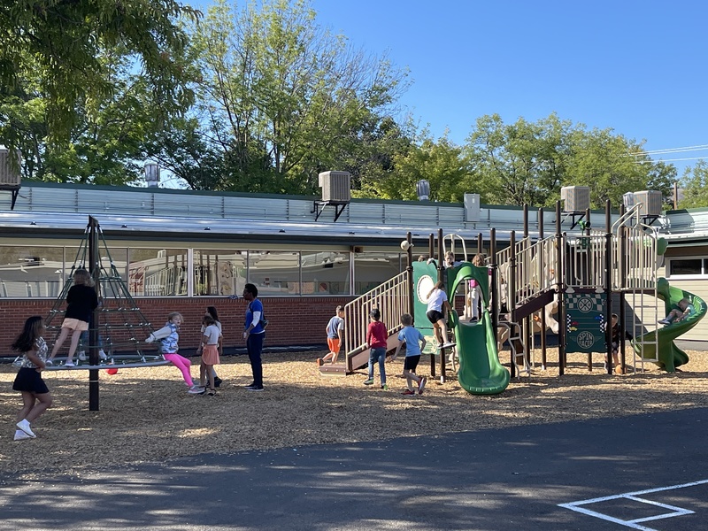 kids on the Greenwood courtyard playground