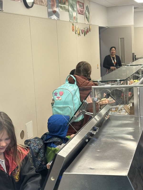 students in the line for pancakes