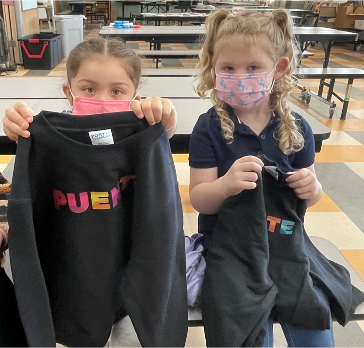 two students with sweatshirts