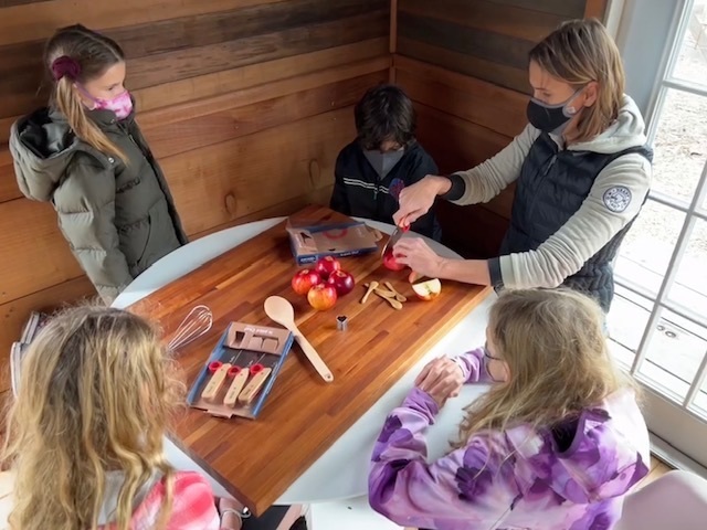 students and instructor working together