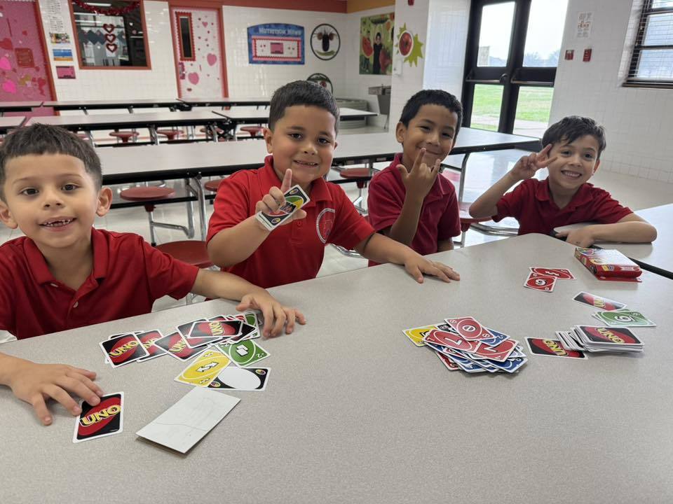 boys playing card game