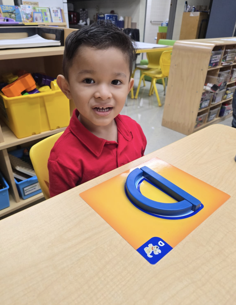 Ms. Y. Campos students learning letters