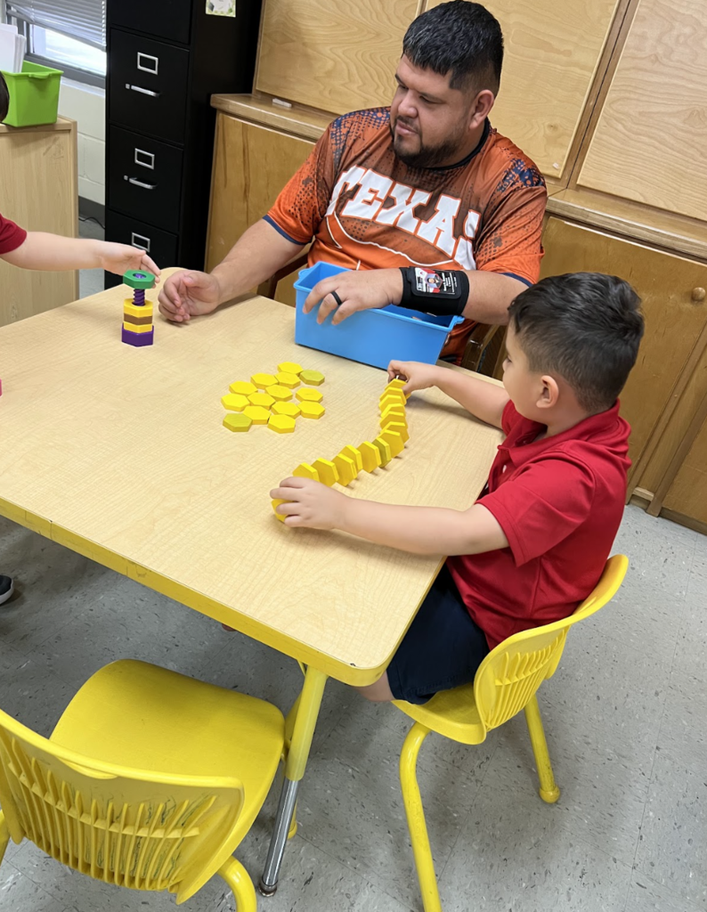 Ms. Y. Campos students learning letters