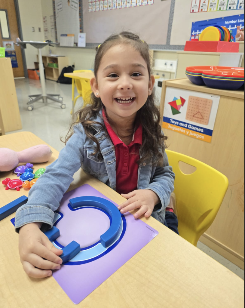 Ms. Y. Campos students learning letters