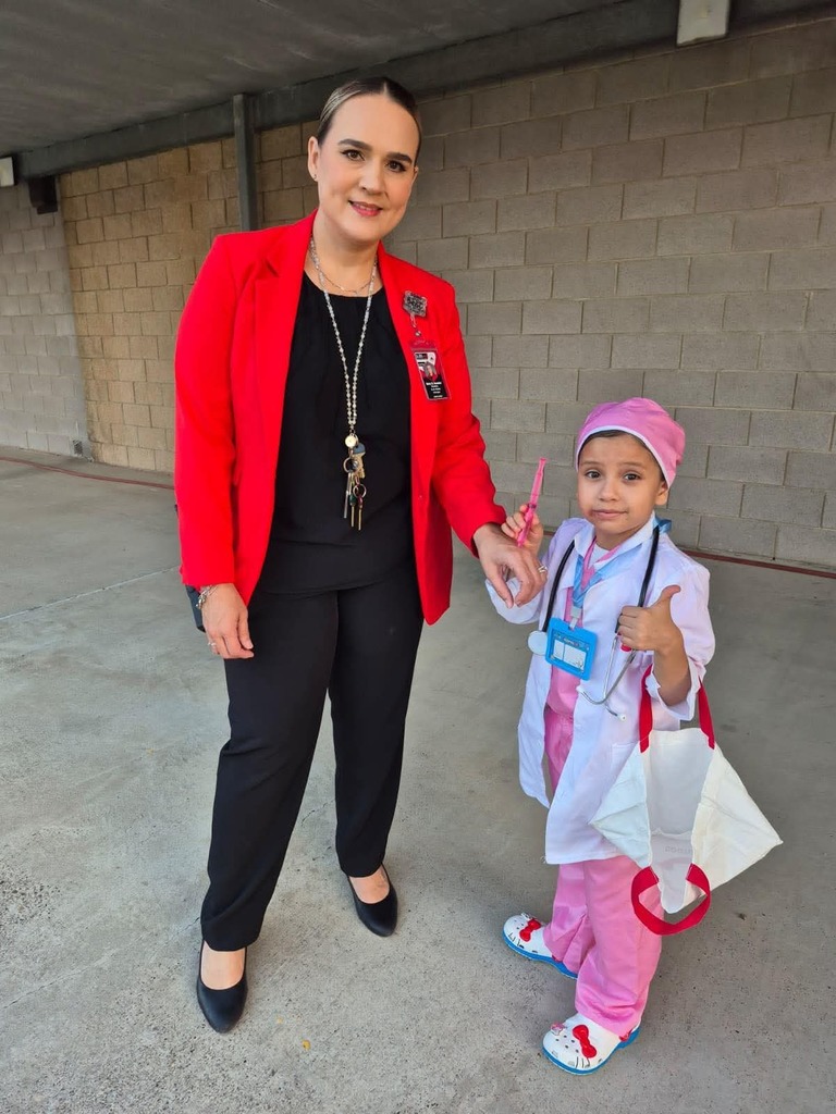 Career Day dress up by student and principal