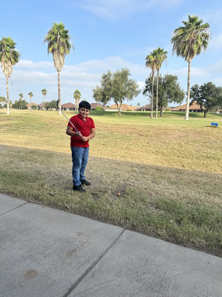 students playing golf 