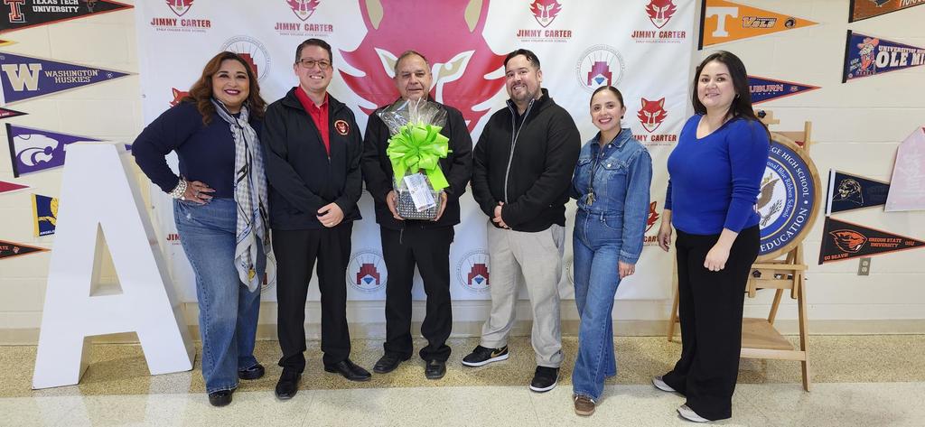 Staff recognizing Dr. Garza