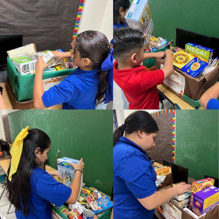 students and teachers distributing food boxes