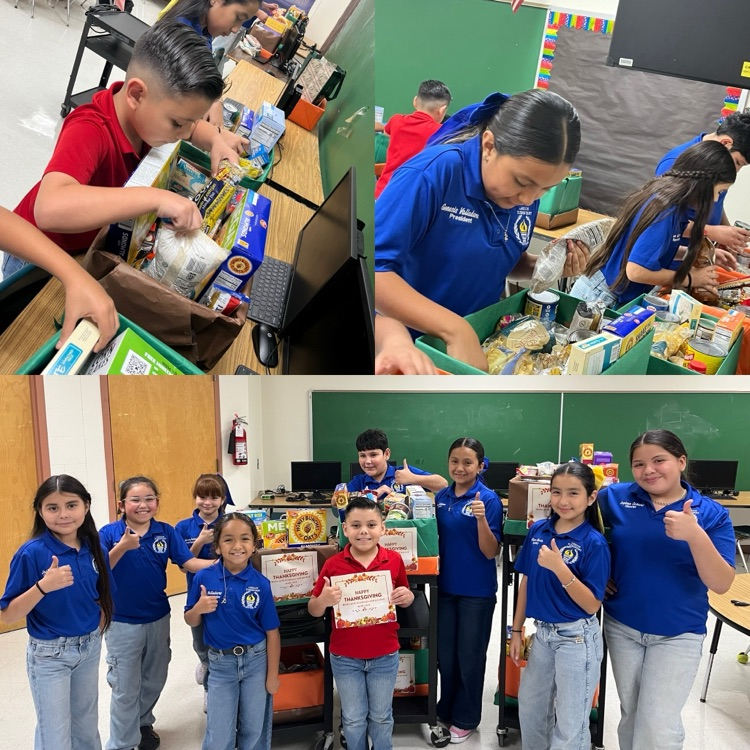 students and teachers distributing food boxes
