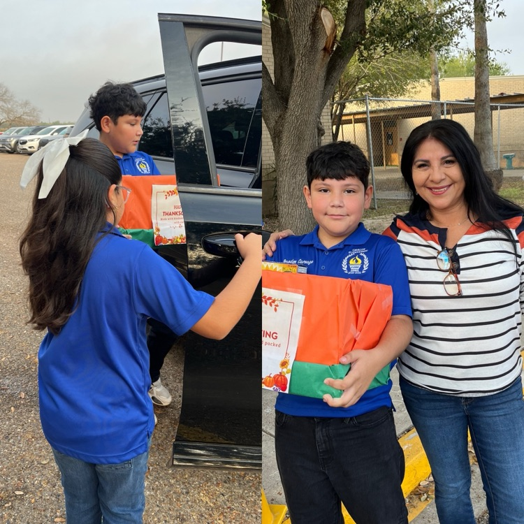 students and teachers distributing food boxes
