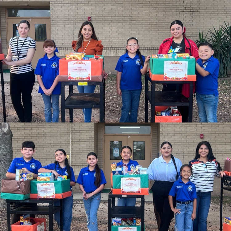 students and teachers distributing food boxes