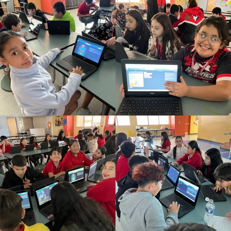 students coding on the computer 