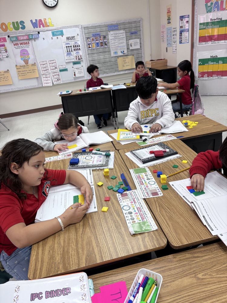 students using math manipulatives 