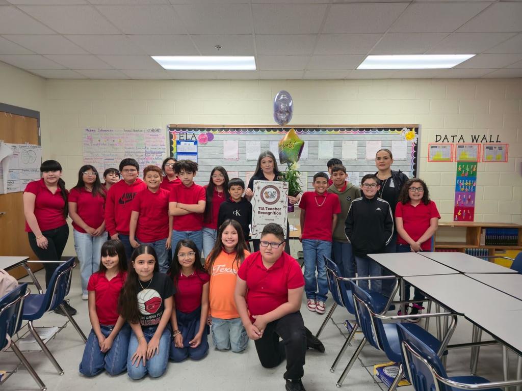 surprise visit from principal with balloons and plant