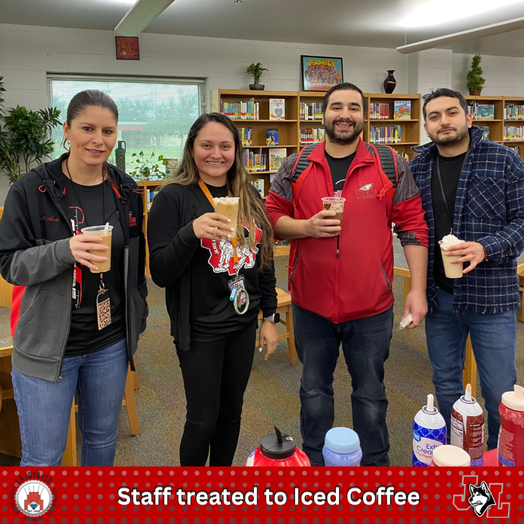 staff posing with coffee