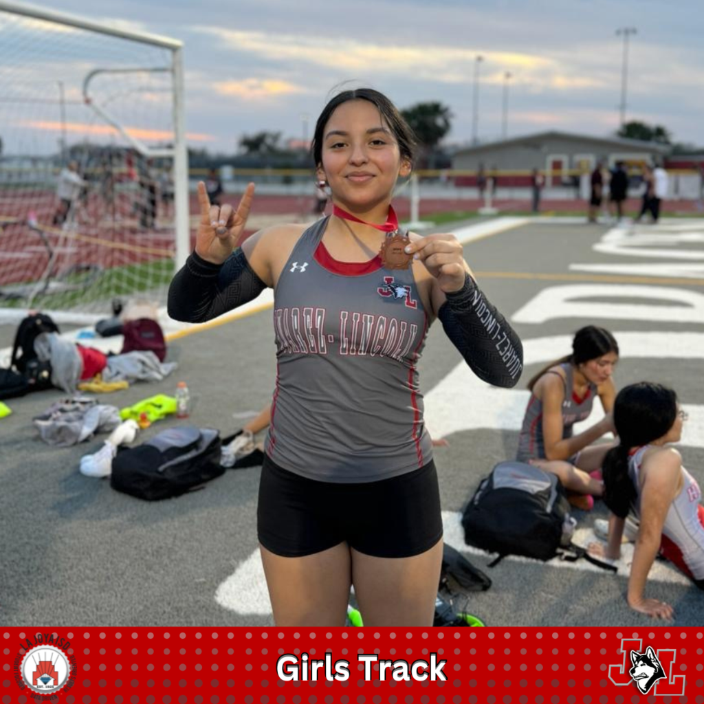 track girls posing with medals