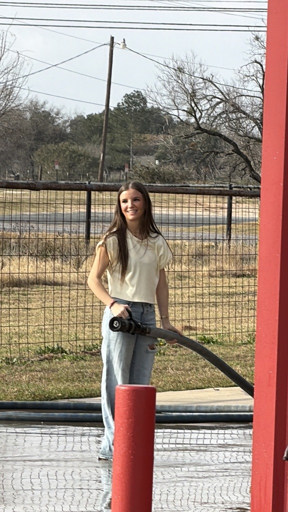 Student with fire hose (no water)