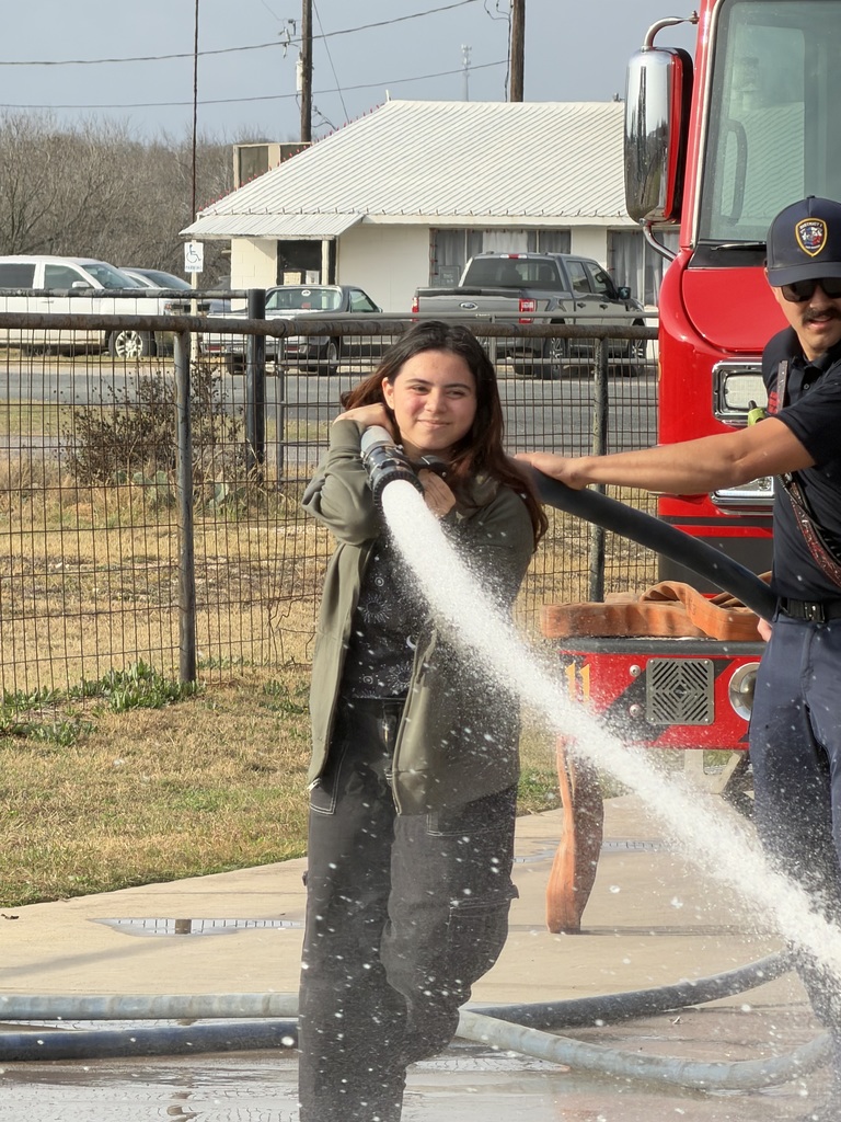 Student with fire hose