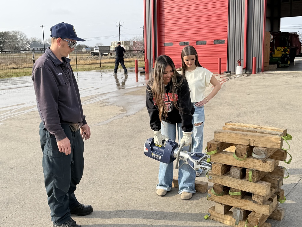 Students using a tool