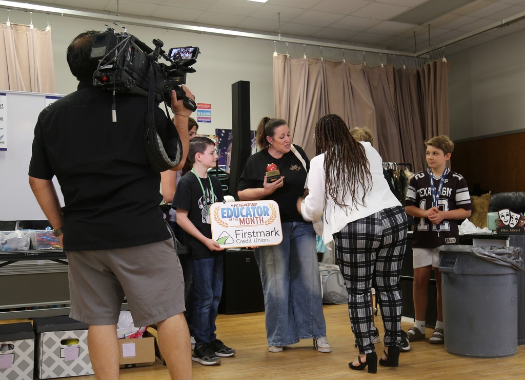 Mrs. Nored receiving her award