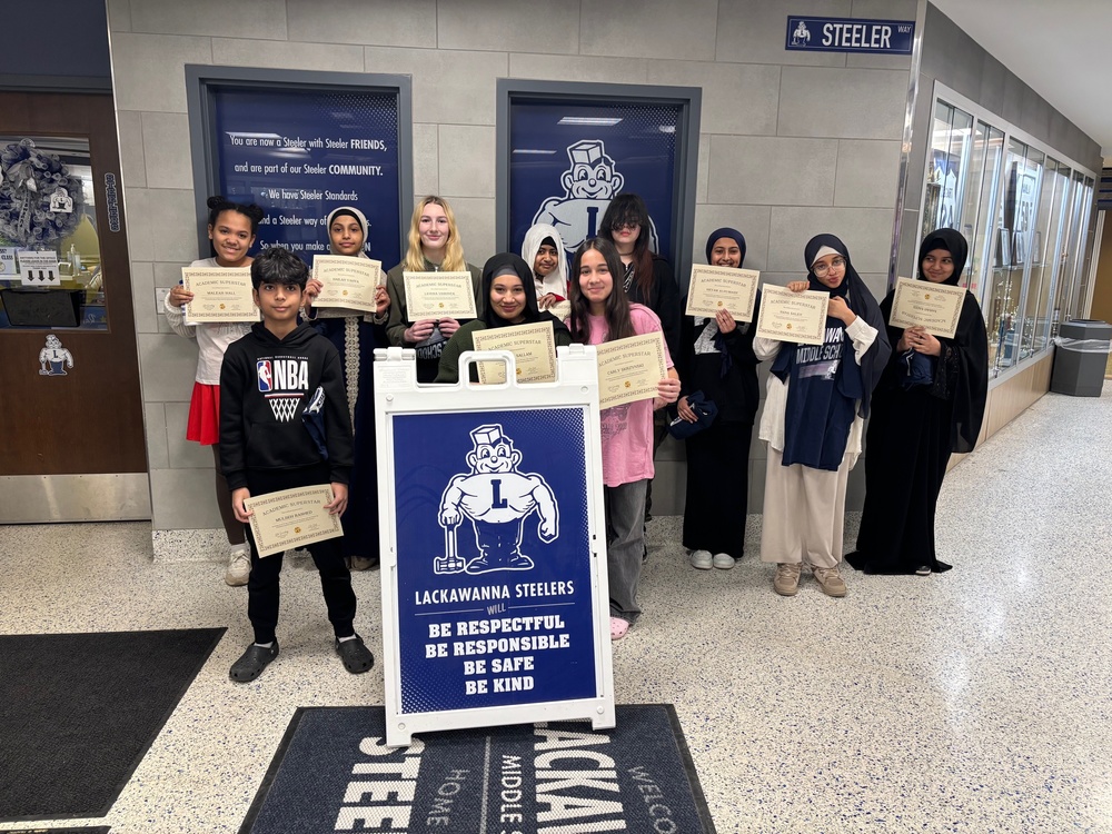 Top 5 students of each LMS grade pose for a photo