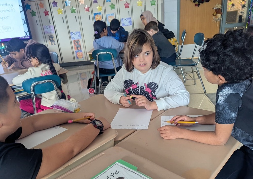 Students work in class.