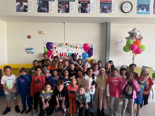 September birthday students pose for a photo