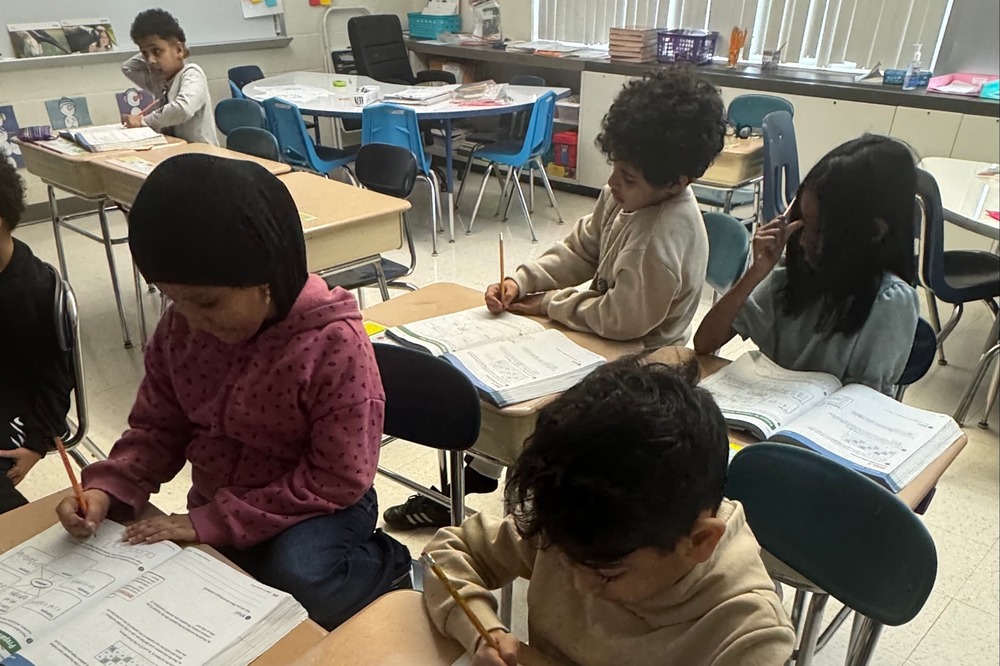 Students work in class.